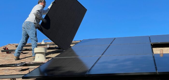 Fitting solar panels to a roof