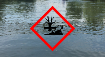 Photo of the River Wye with a pollutant sign in front